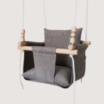Toddler swing with safety belt and pillows